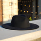 A photo of dope headwear's black color wide brim fedora hat in XXL size.