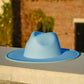 Dope Headwear product photo of a light blue colored wide brim fedora hat.