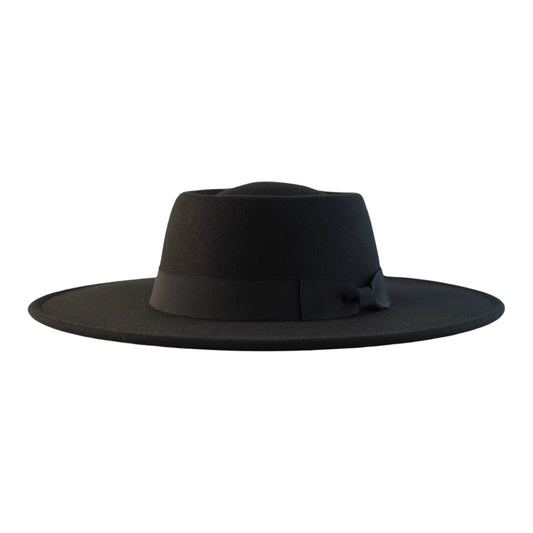 A black color bolero fashion hat with a large brim.